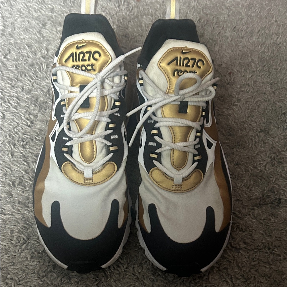 Nike Air Zoom Sneakers in Black, White, and Gold